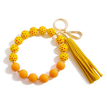 Load image into Gallery viewer, Orange~ Coated Bead and Heart Pattern Wooden Bead Bracelet Keychain With Leather Tassel